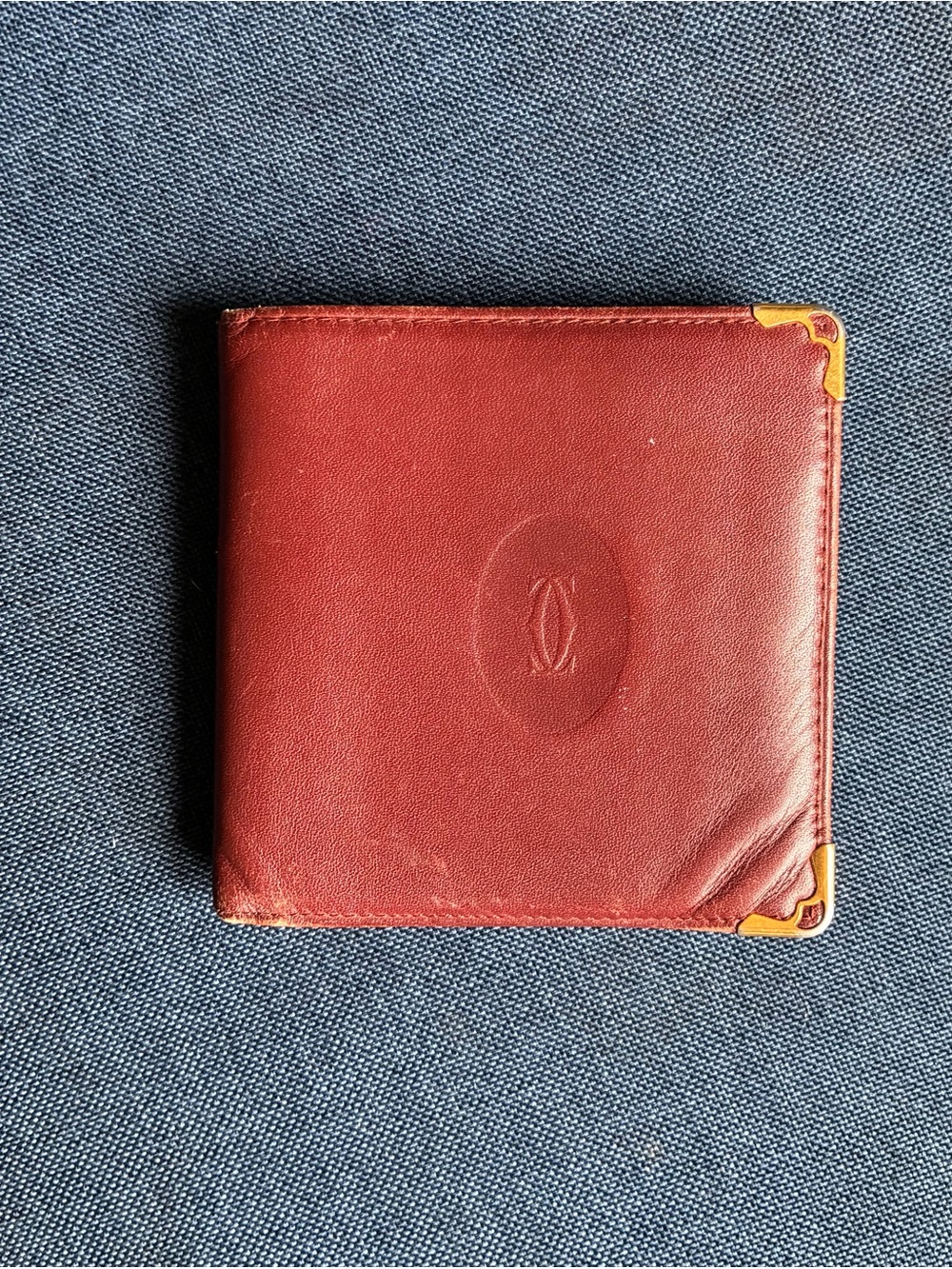 Cartier Red Leather Bifold Wallet with Gold Corner Accents